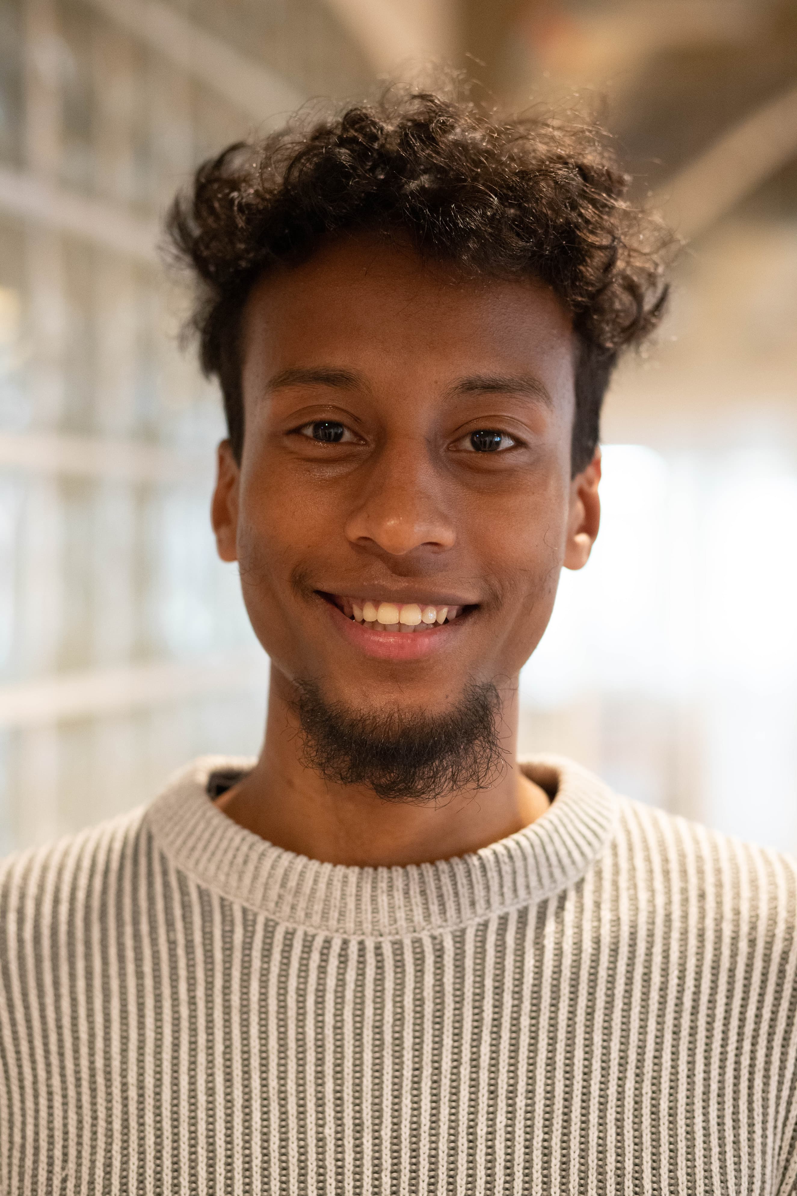 Portrait of Saminas Hagos Gigar, software engineer in Hamburg